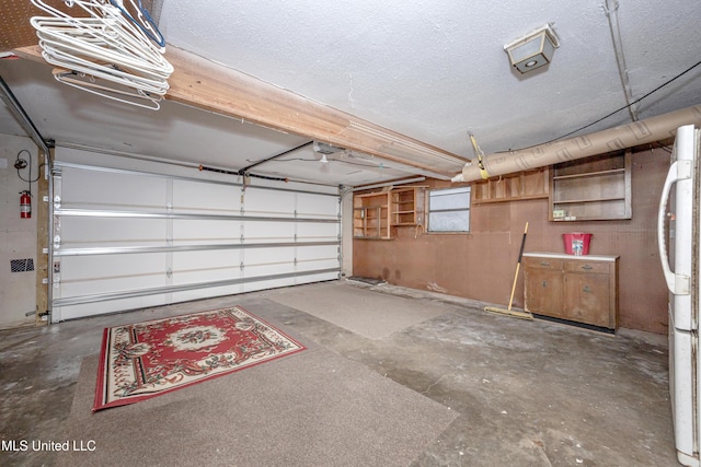 garage featuring freestanding refrigerator