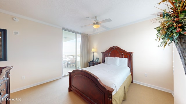 bedroom with access to outside, ornamental molding, light colored carpet, a textured ceiling, and ceiling fan