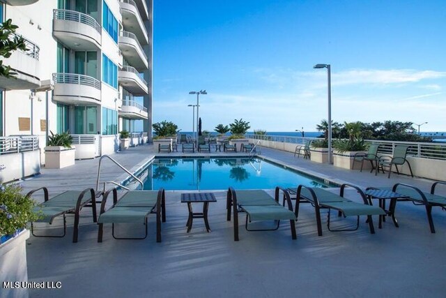 2060 Beach Blvd Unit 701, Biloxi, MS 39531 - community pool featuring a patio