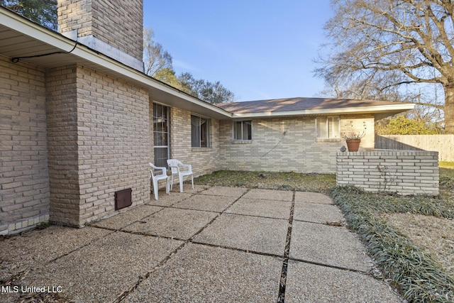 view of patio with fence