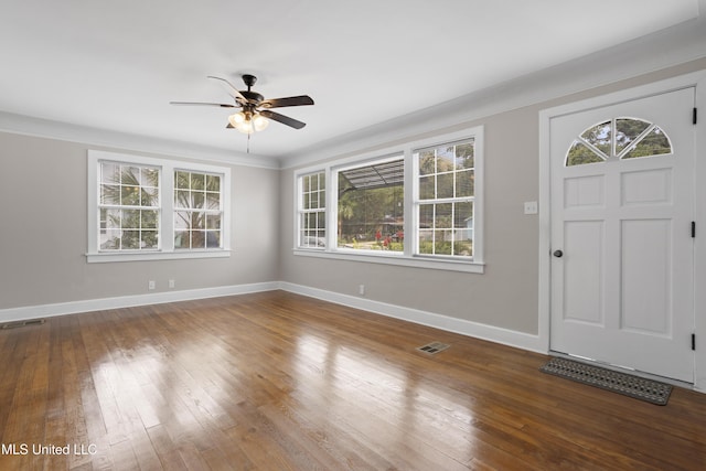 157 Saint Charles Ave, Biloxi, MS 39530 - entryway featuring ceiling fan, plenty of natural light, and hardwood / wood-style floors