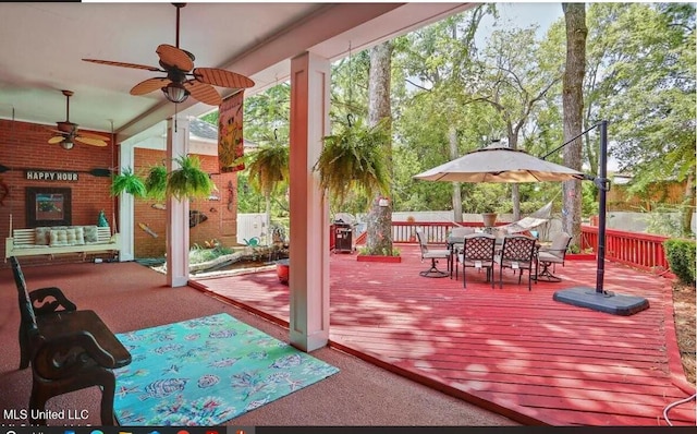 47 Avery Cir, Jackson, MS 39211 - deck with a ceiling fan and outdoor dining space