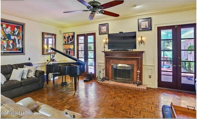 47 Avery Cir, Jackson, MS 39211 - living area with french doors, a ceiling fan, ornamental molding, and a fireplace
