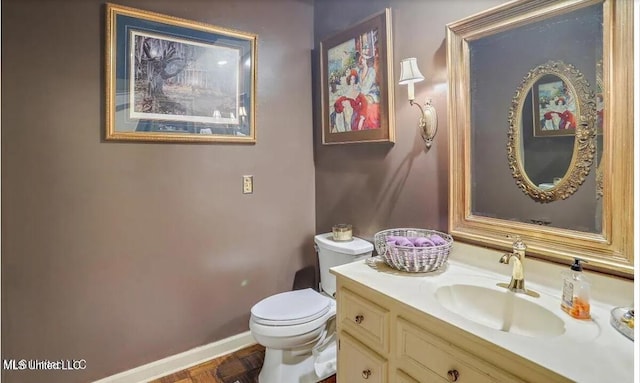 47 Avery Cir, Jackson, MS 39211 - bathroom featuring toilet and vanity
