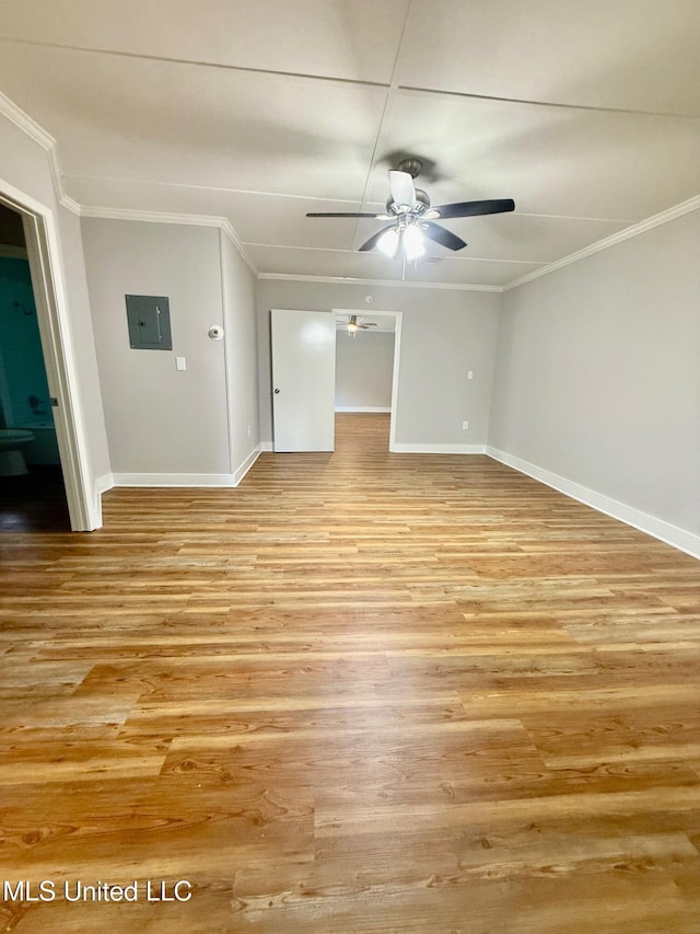 119 Chinquipin Ln, Florence, MS 39073 - empty room with crown molding, a ceiling fan, light wood-type flooring, and electric panel