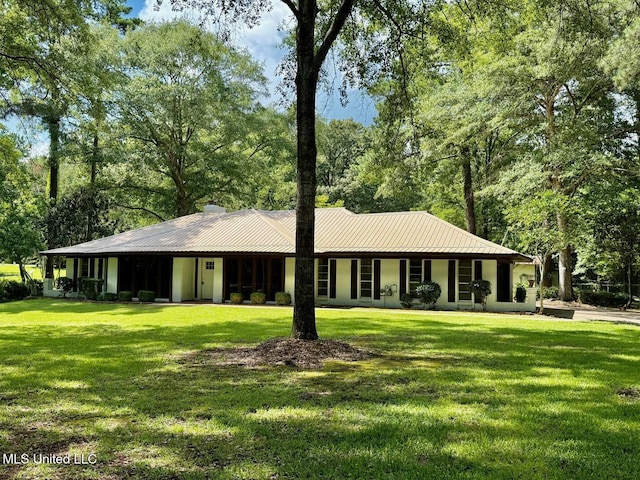 119 Chinquipin Ln, Florence, MS 39073 - single story home featuring a front yard, a chimney, and a metal roof