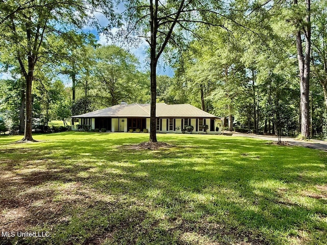 119 Chinquipin Ln, Florence, MS 39073 - ranch-style house featuring a front yard and view of scattered trees
