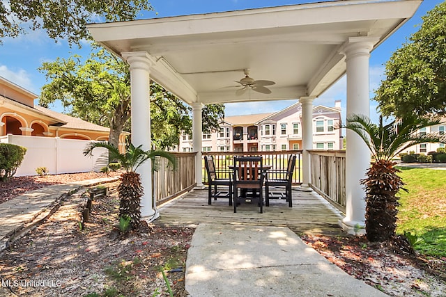 view of patio / terrace featuring fence and a ceiling fan