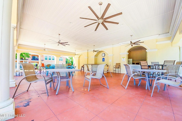 view of patio featuring ceiling fan and outdoor dining area