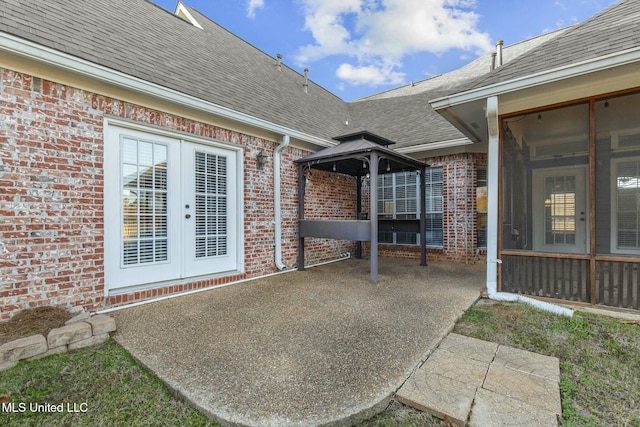 view of patio / terrace featuring a gazebo and french doors