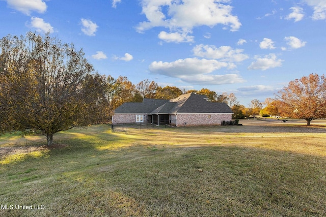 exterior space with a front lawn