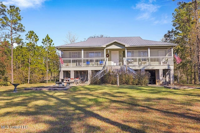 view of front of house featuring a front yard and a porch