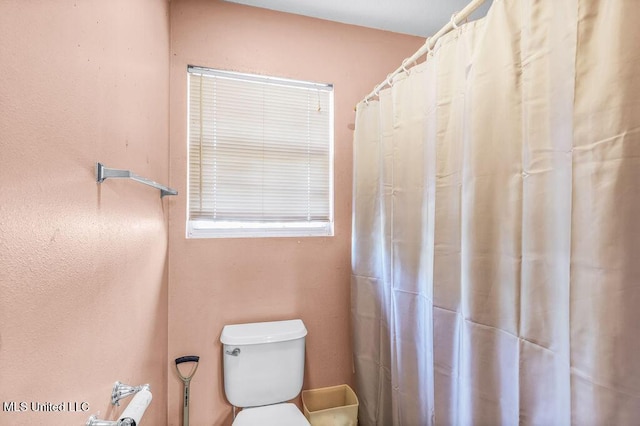 bathroom featuring toilet