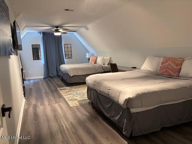 220 Forked Creek Pkwy, Hernando, MS 38632 - bedroom featuring wood finished floors and vaulted ceiling