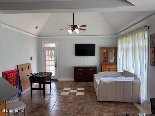 220 Forked Creek Pkwy, Hernando, MS 38632 - living area with vaulted ceiling, ceiling fan, baseboards, crown molding, and dark tile patterned floors