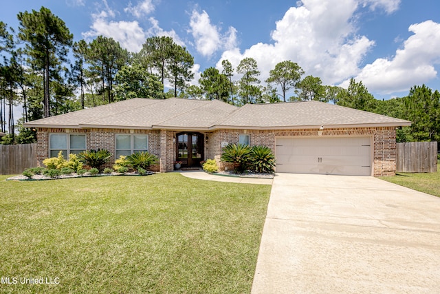 ranch-style house with a front lawn and a garage