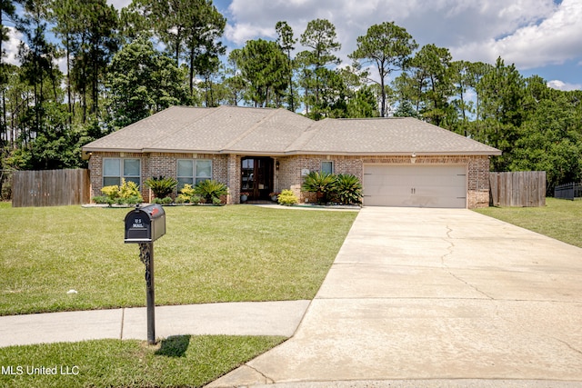 single story home featuring a front lawn and a garage