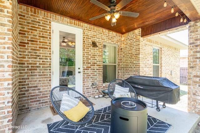 view of patio / terrace with area for grilling and ceiling fan