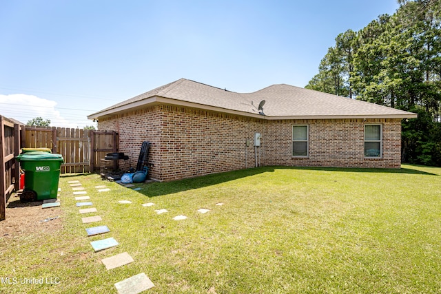 view of home's exterior featuring a lawn