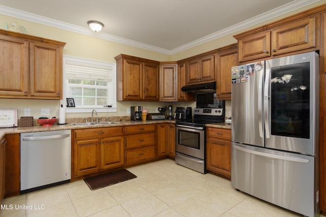 kitchen with sink, light tile patterned floors, ornamental molding, appliances with stainless steel finishes, and light stone counters