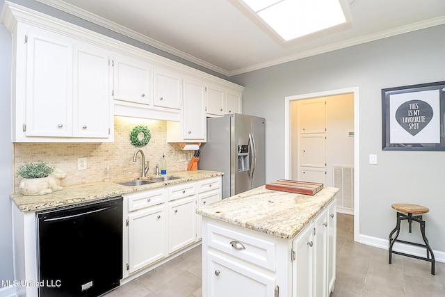 kitchen featuring black dishwasher, a sink, stainless steel fridge, white cabinets, and crown molding