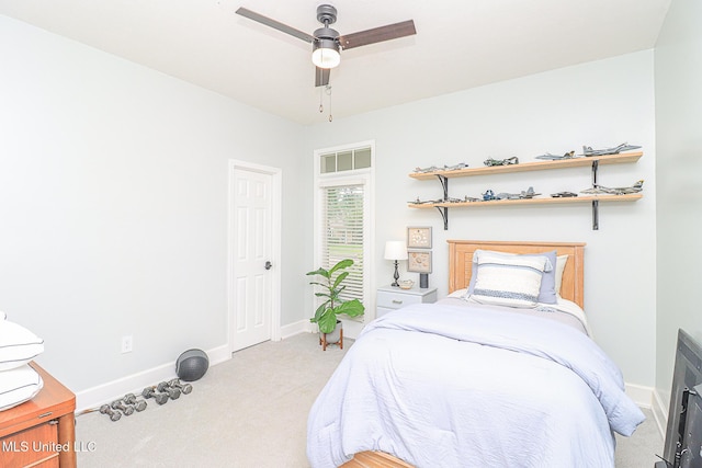 bedroom featuring carpet flooring, baseboards, and ceiling fan