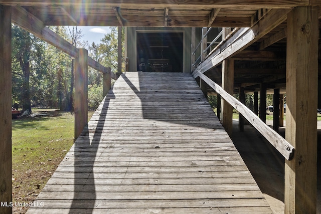 wooden deck with a yard