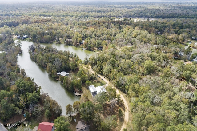 aerial view featuring a water view and a forest view