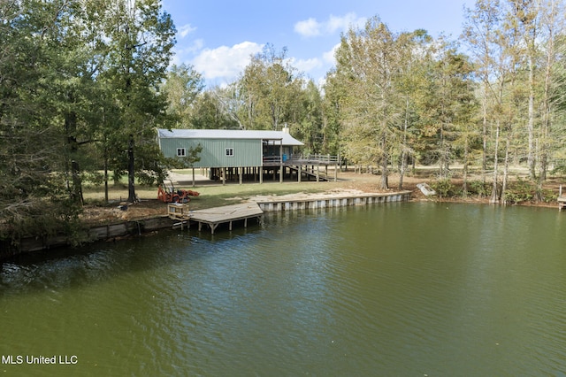 view of dock with a deck with water view