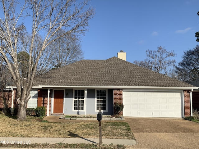 single story home with a garage