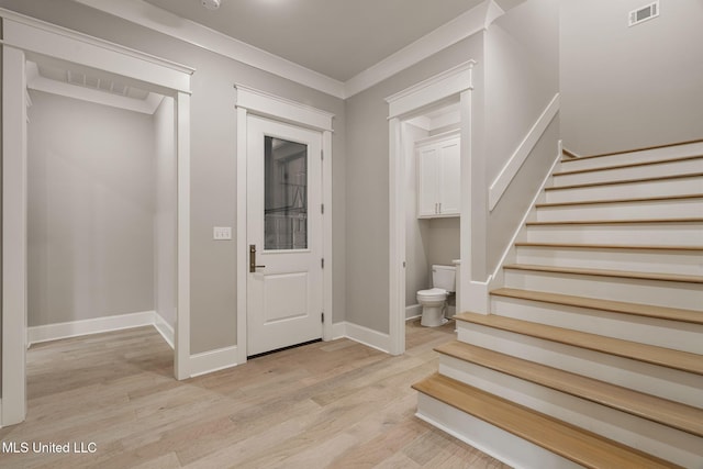 9 Sanctuary Ln, Sumrall, MS 39482 - entrance foyer featuring stairway, baseboards, light wood-type flooring, and visible vents