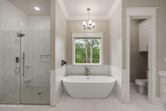9 Sanctuary Ln, Sumrall, MS 39482 - full bathroom with an inviting chandelier, toilet, marble finish floor, a shower stall, and a soaking tub