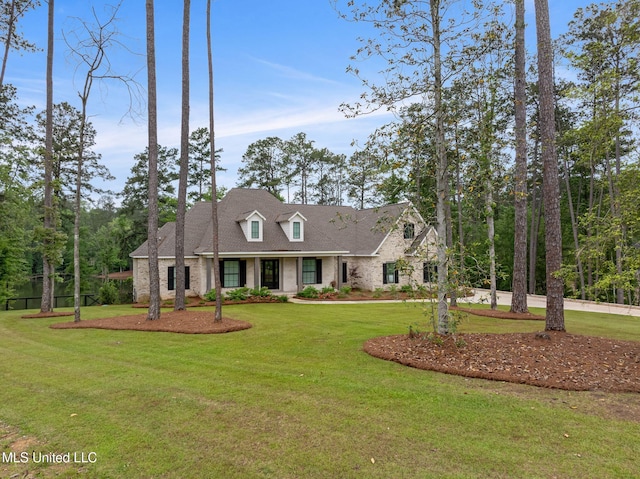 9 Sanctuary Ln, Sumrall, MS 39482 - cape cod home with a front yard