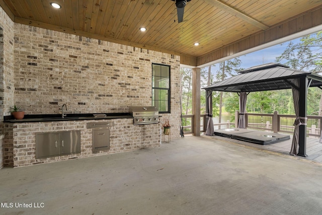 9 Sanctuary Ln, Sumrall, MS 39482 - view of patio / terrace with a gazebo, exterior kitchen, a sink, and area for grilling