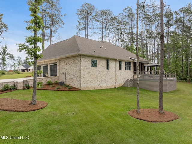 9 Sanctuary Ln, Sumrall, MS 39482 - rear view of house with a lawn, a gazebo, and stairway