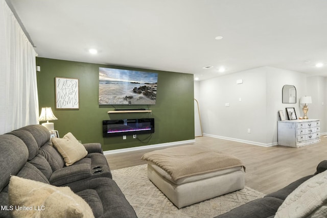 living room featuring light wood-type flooring