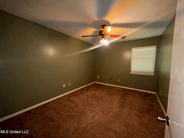 unfurnished room featuring carpet and ceiling fan