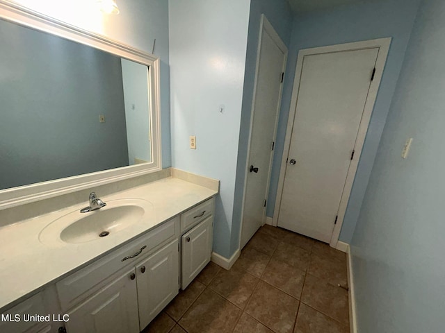 bathroom featuring vanity and tile patterned floors