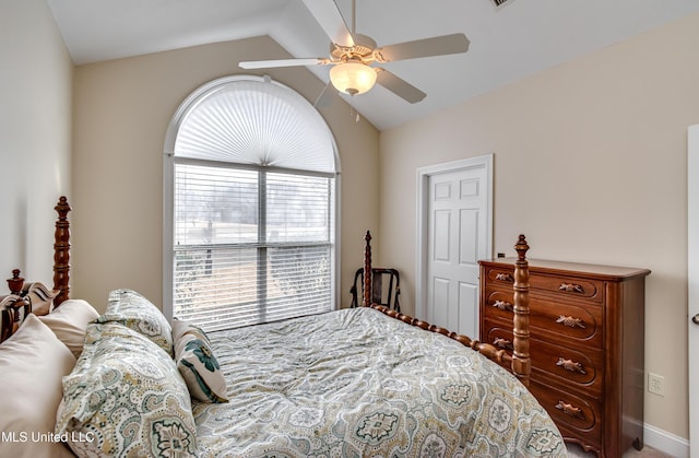 bedroom with vaulted ceiling and ceiling fan