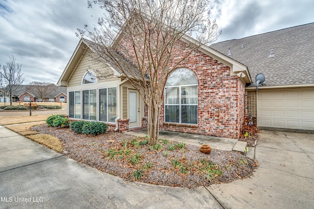 view of front of property with a garage