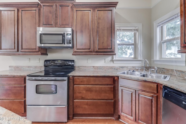 25 Oak Alley Ln Unit 25, Long Beach, MS 39560 - kitchen featuring stainless steel appliances, light countertops, and ornamental molding