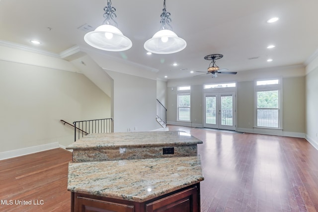 25 Oak Alley Ln Unit 25, Long Beach, MS 39560 - kitchen featuring ornamental molding, healthy amount of natural light, wood finished floors, ceiling fan, and recessed lighting