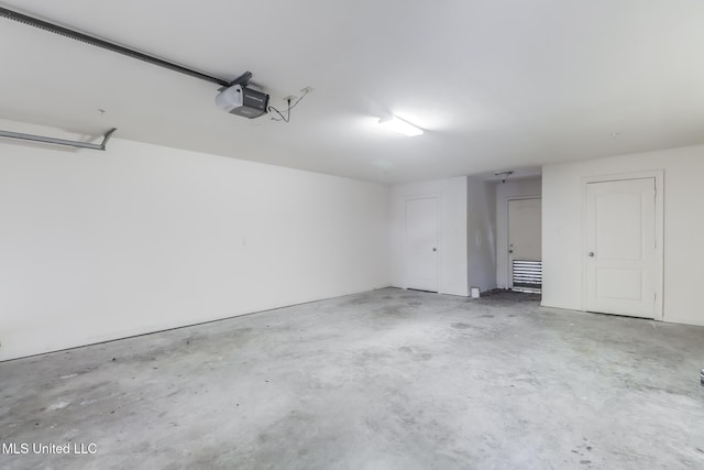 25 Oak Alley Ln Unit 25, Long Beach, MS 39560 - garage featuring a garage door opener