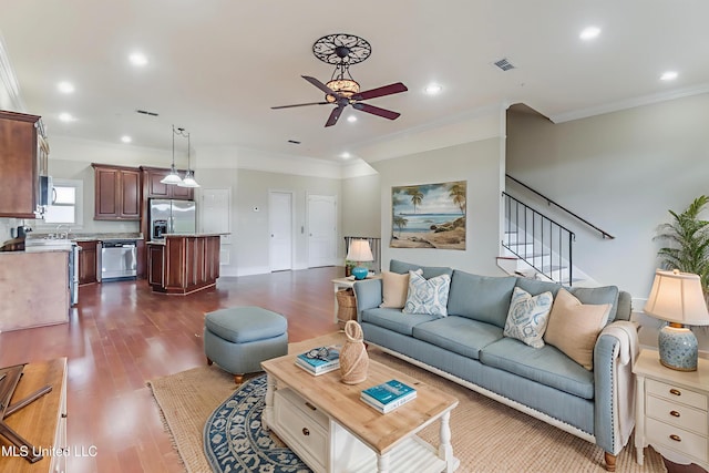 25 Oak Alley Ln Unit 25, Long Beach, MS 39560 - living room with a ceiling fan, dark wood-type flooring, ornamental molding, stairway, and recessed lighting