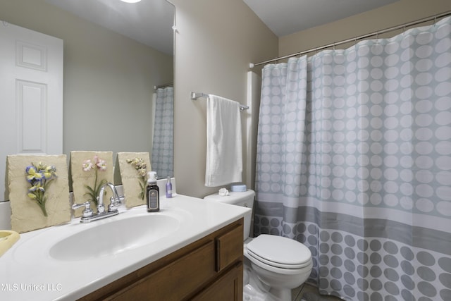 311 Pinecrest Blvd, Long Beach, MS 39560 - bathroom with vanity, toilet, and a shower with curtain