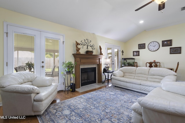 311 Pinecrest Blvd, Long Beach, MS 39560 - living area featuring french doors, ceiling fan, wood finished floors, lofted ceiling, and a fireplace