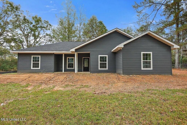 ranch-style house with a front yard