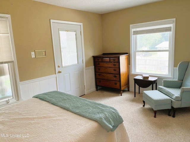 2501 Gulf Ave Unit 22, Gulfport, MS 39501 - carpeted bedroom with a wainscoted wall
