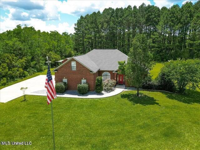 19101 Rucks Krans Rd, Moss Point, MS 39562 - view of front of property featuring a front yard and a view of trees