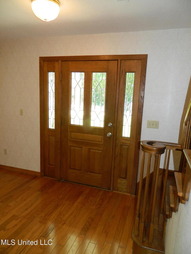 entryway featuring hardwood / wood-style floors